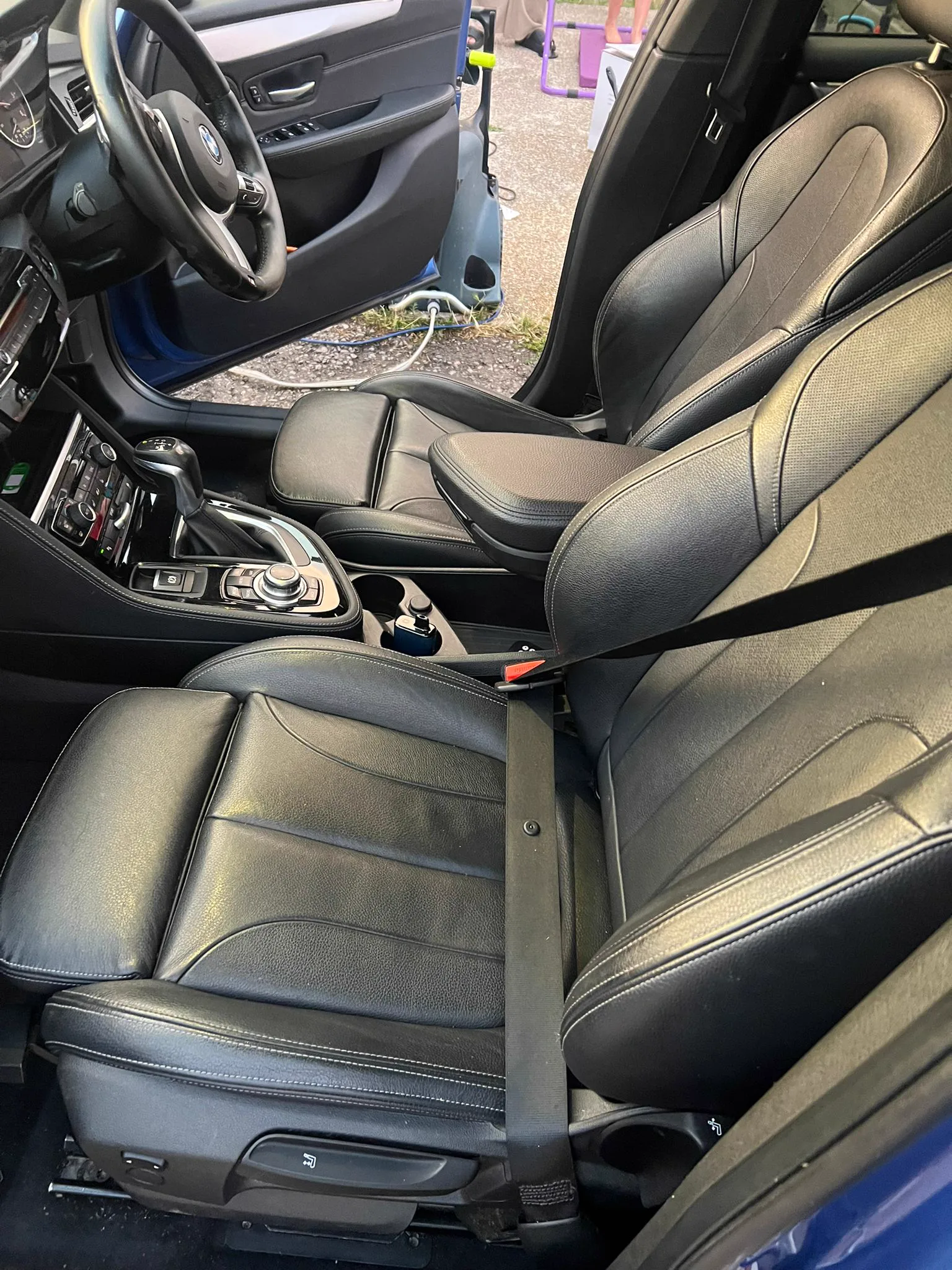 Black leather front seats cleaned and fed in a BMW, Hampshire interior detail